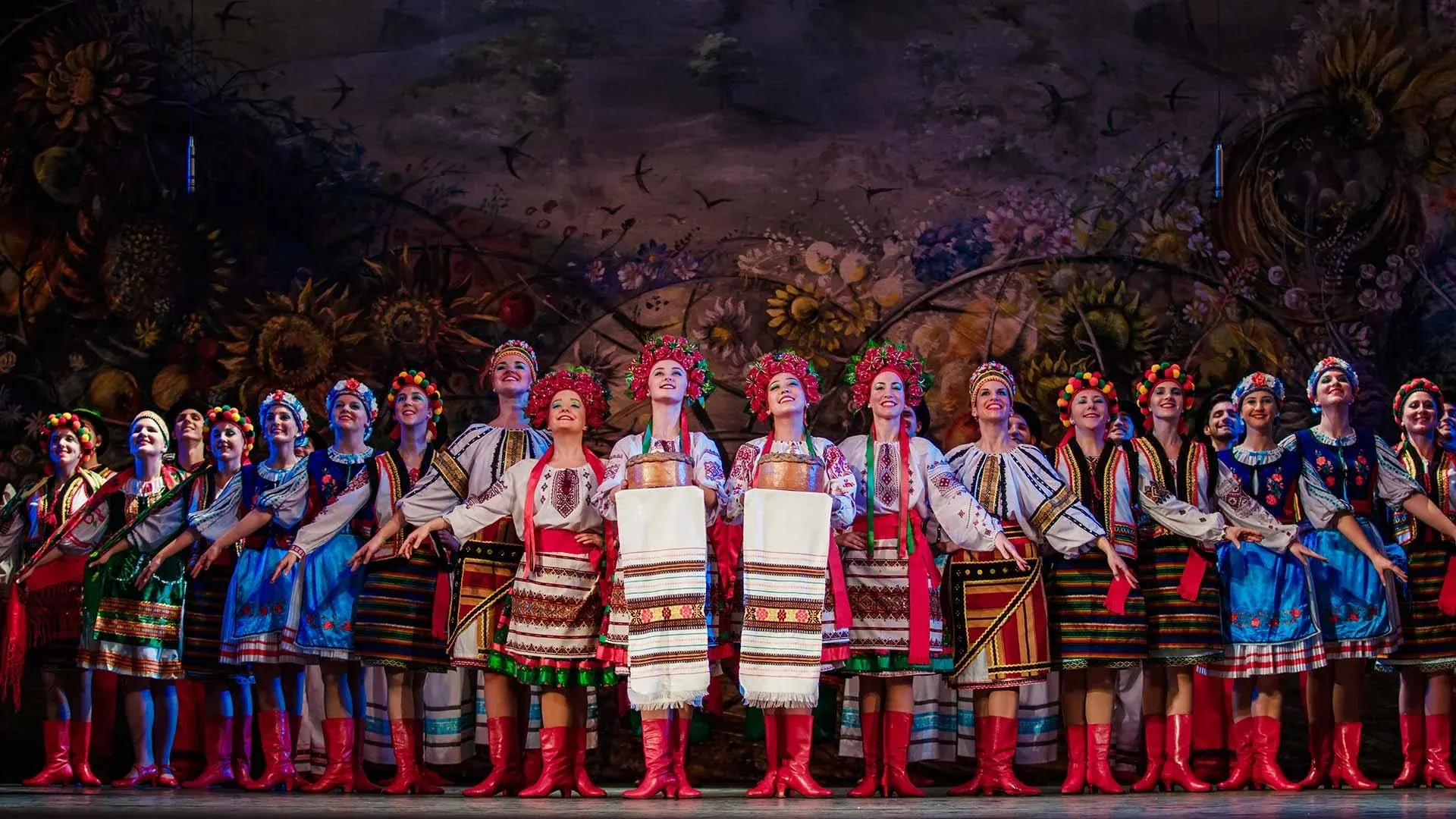 Ukrainian dancers performing in traditional costume on stage